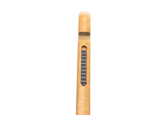 Wooden pen with a black clip on a white background