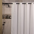 White shower curtain with black hooks in a bathroom setting