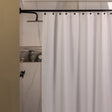 Shower curtain with a textured pattern in a bathroom setting