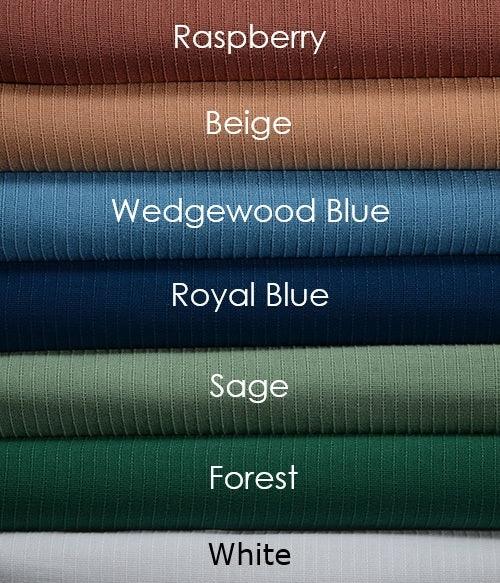 Product shot of stacked bed spreads on top of each other in a variety of colors. From top to bottom names are; Raspberry, a reddish brown, Beige, Wedgewood Blue, Royal Blue, Sage Green, Forest Green, White. Wholesale supplier of bed linens for hotels, healthcare and hospitality.