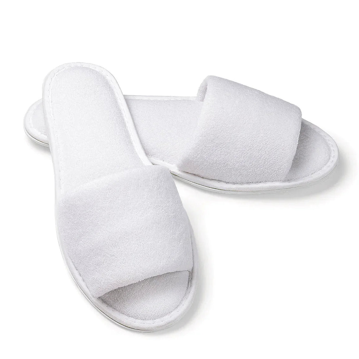 Pictured: White open toe fluffy slippers against a white background.