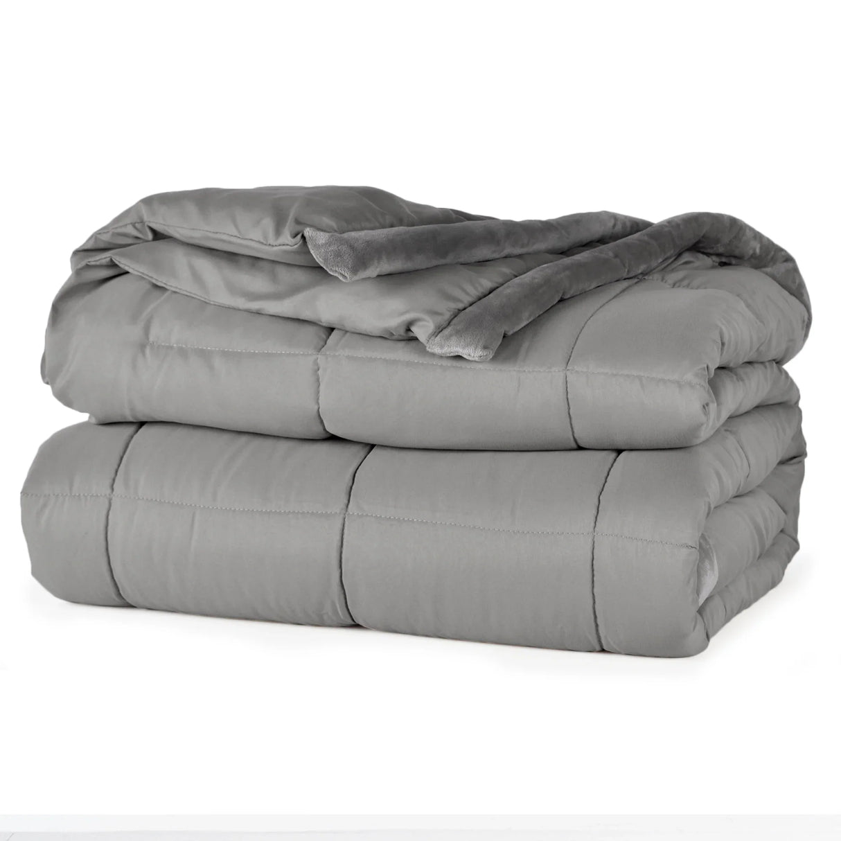 Smoke grey colored fluffy and luxurious blanket neatly folded. Product shot.