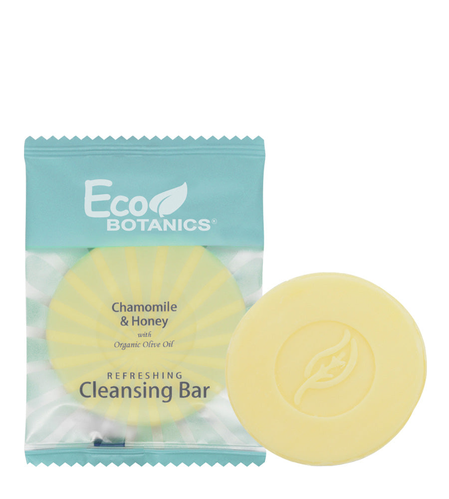 Yellow Chamomile and honey cleansing bar with organic olive oil. Product shot shows product in and out of packaging on a white background.