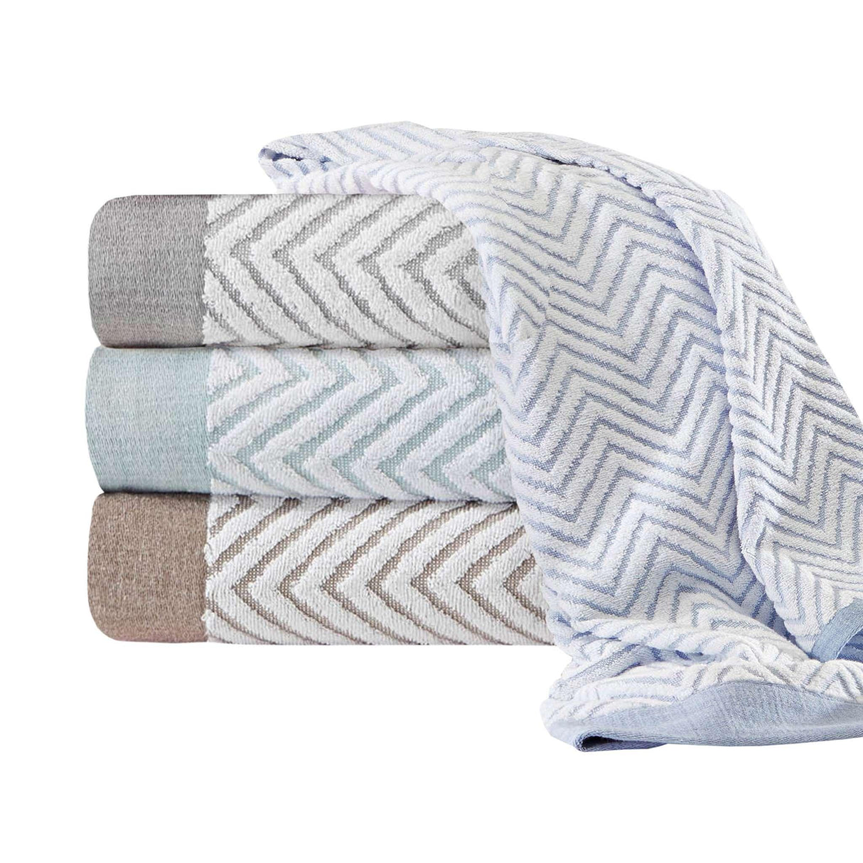 Product photoshoot of multiple hotel linen towels folded on top of eachother in a variety of colors. White background.