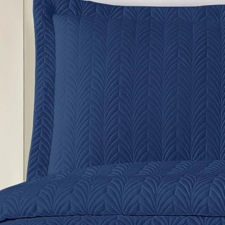 Leaf stitch design on bedding quilt. Hotel wholesale supply.