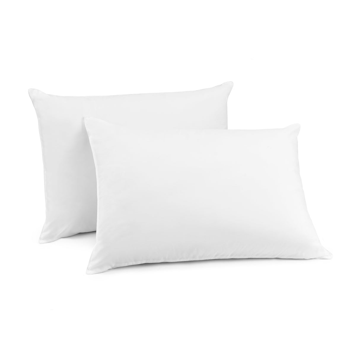 Product shot of two fluffy pillows leaned up against each other with a plain white background.