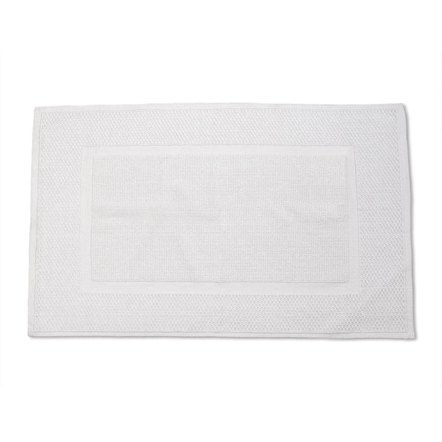 White textured bath mat on a white background