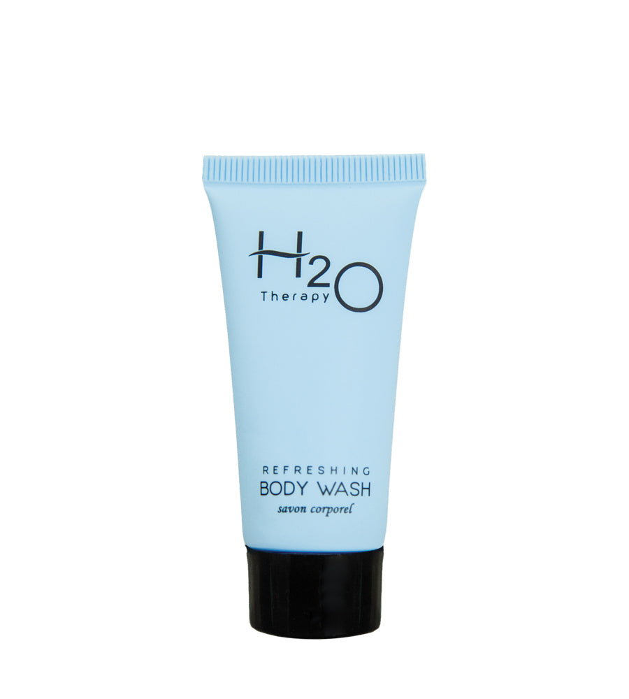 Product shot of H2O Therapy refreshing body wash hotel amenity sample size on a white background.