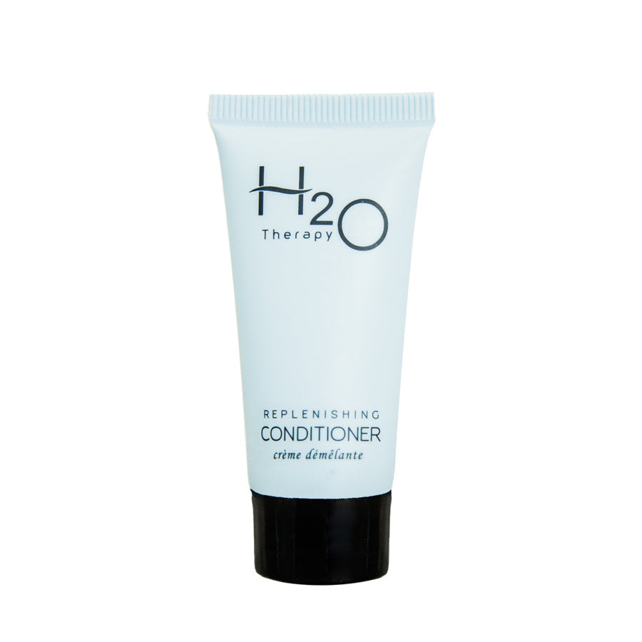 Pictured: H2O Therapy Replenishing Conditioner in an off-white squeeze tube, standing up on the black cap against a white background.
