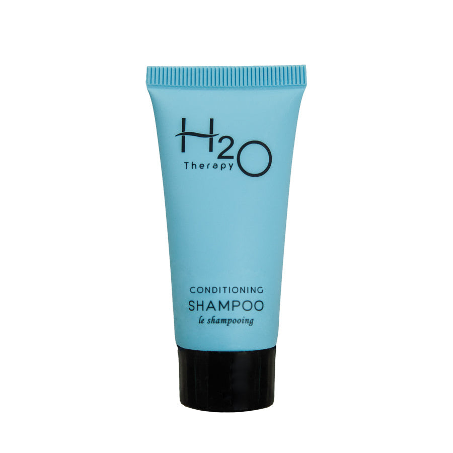 Pictured: H2O Therapy Conditioning Shampoo in a blue squeeze tube, standing up on the black cap against a white background.