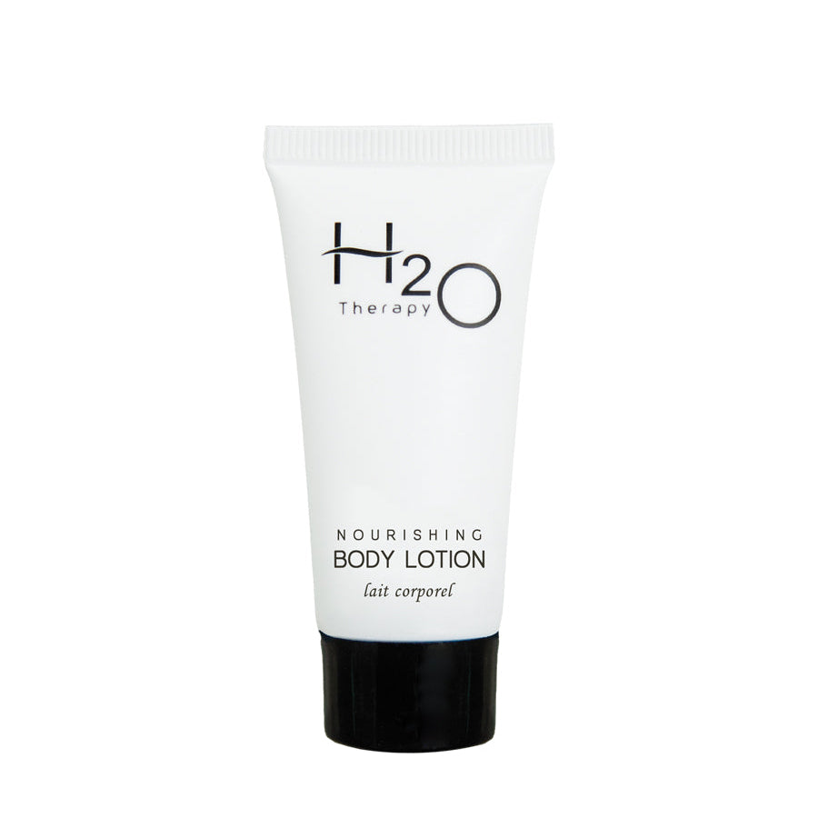 Pictured: H2O Therapy Nourishing Body Lotion in a white squeeze tube, standing up on the black cap against a white background.