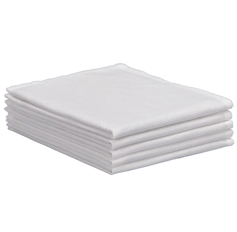 A stack of white 100% cotton Huck towels.