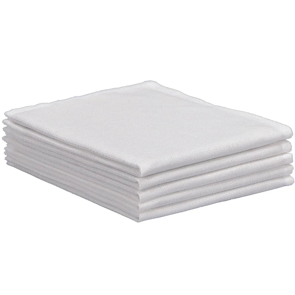 Pictured: Neatly folded stack of Huck Towels against a white background.