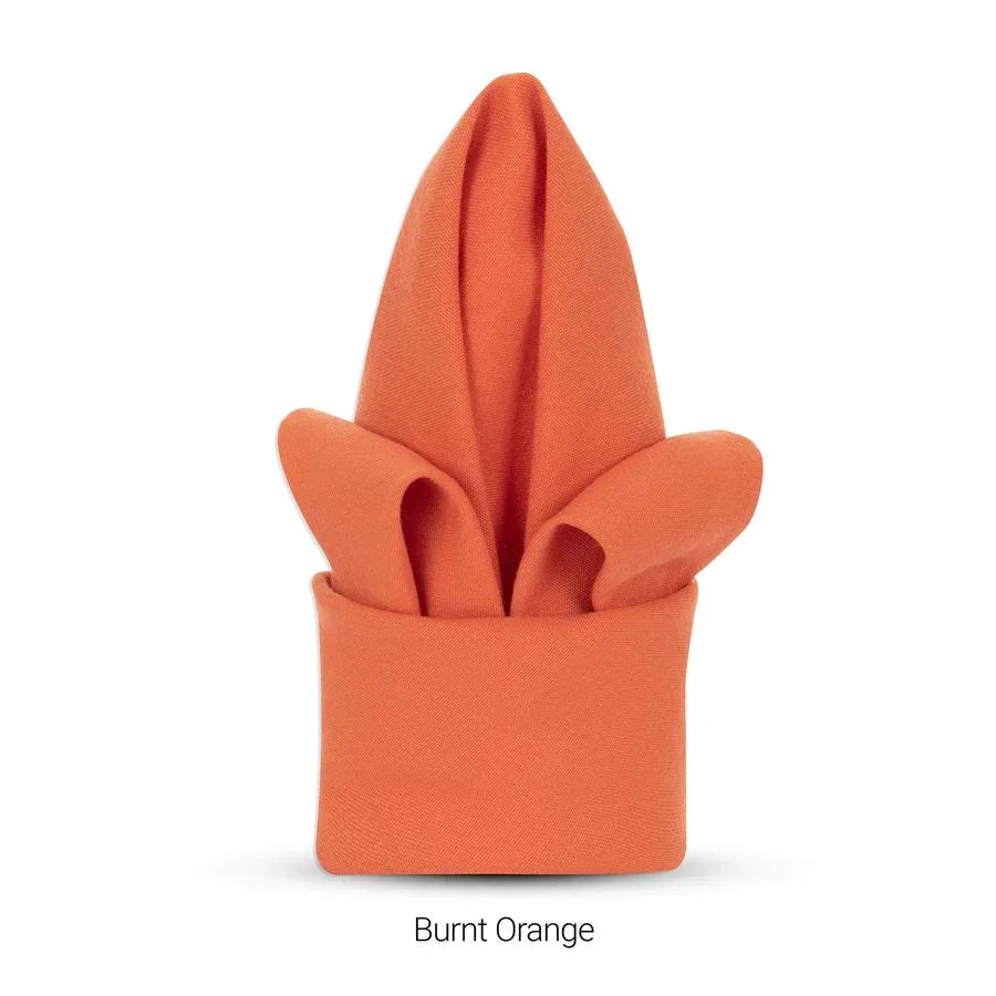 Burnt orange colored polyester napkin for hotels and restaurants.