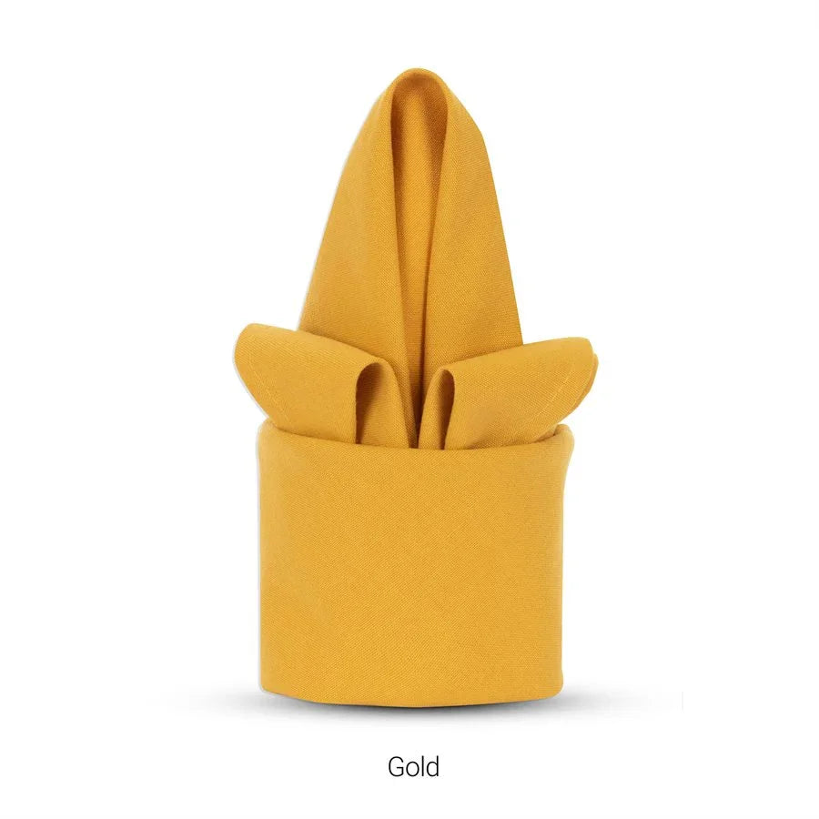 Yellow gold colored polyester napkin for hotels and restaurants.
