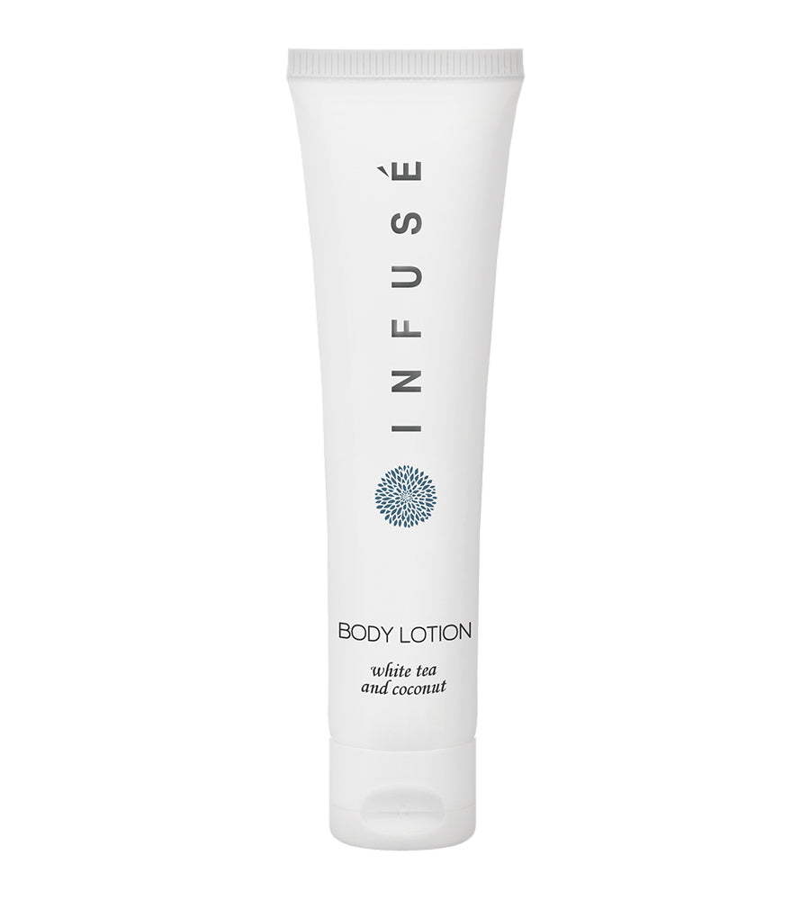 Product shot of Infuse white hotel amenity collection body lotion with white tea and coconut. White background.