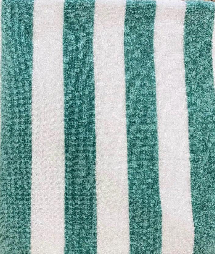 Product closeup of the oxford cabana striped towel in mint green and white. Product is 100% cotton and is super soft. Sold wholesale supply for hotels, healthcare and hospitality.