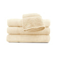 A set of beige pool towels stacked neatly, with a classic dobby border.