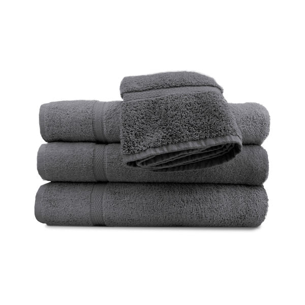 A set of grey pool towels stacked neatly, with a classic dobby border.