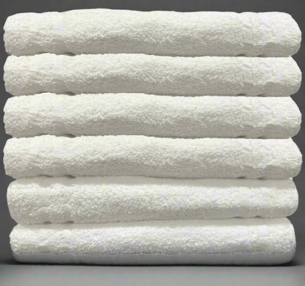 Product shot of healthcare towels in shade white, photo for wholesale supplier for healthcare, hotels and hospitality.