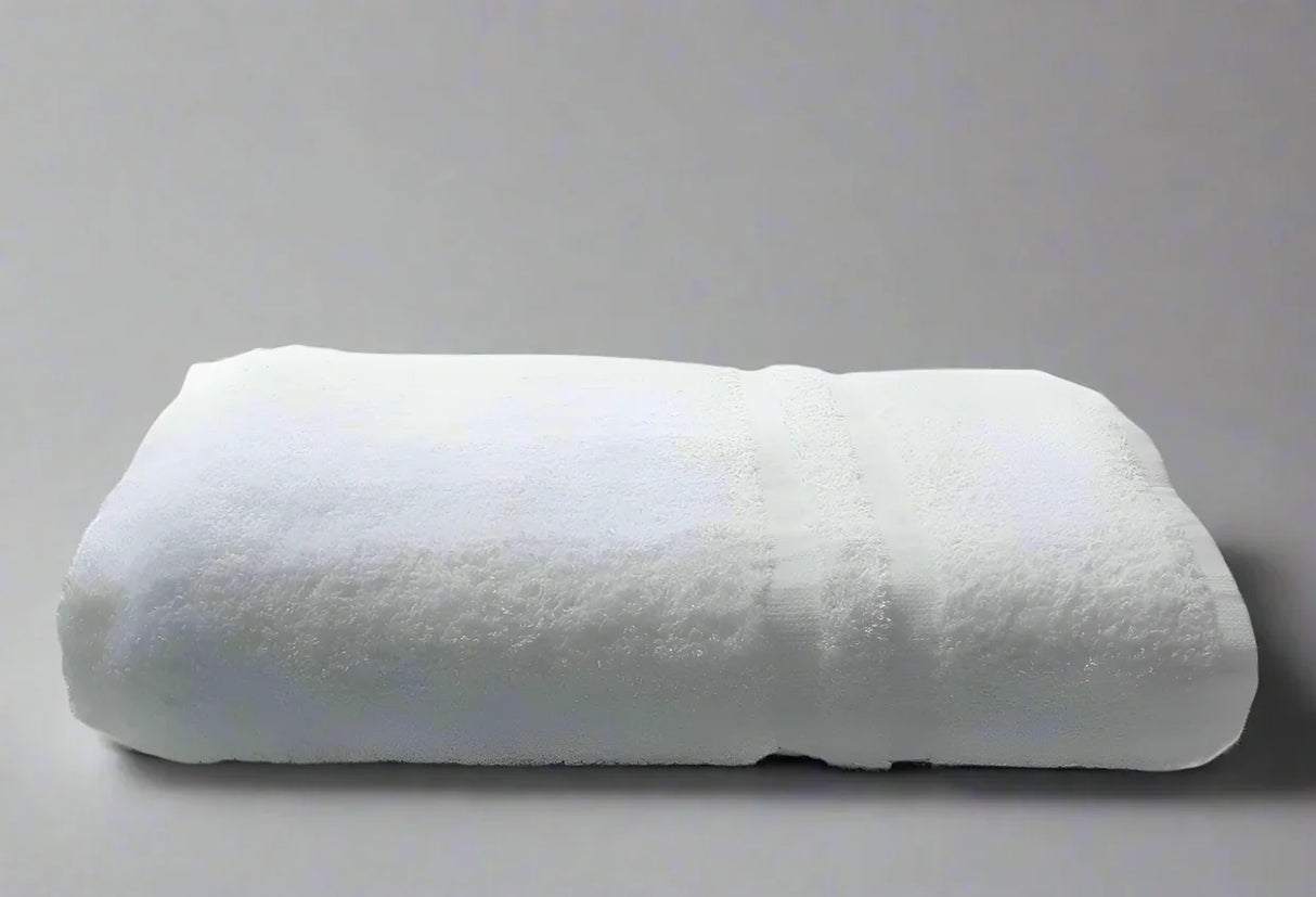 Product shot of healthcare towels in shade white, photo for wholesale supplier for healthcare, hotels and hospitality.