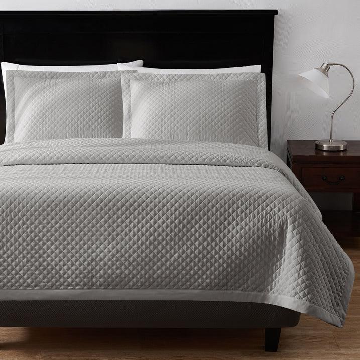 Diamond stitch quilt in light rey by Boston Textile Co. Perfect for hotel wholesale.
