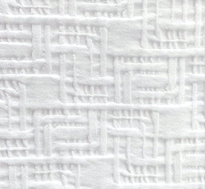 White textured fabric with a raised basketweave or woven geometric pattern.