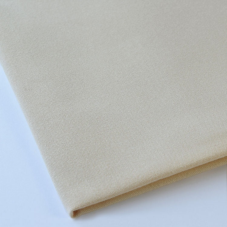 beige colored napkin tablecloth