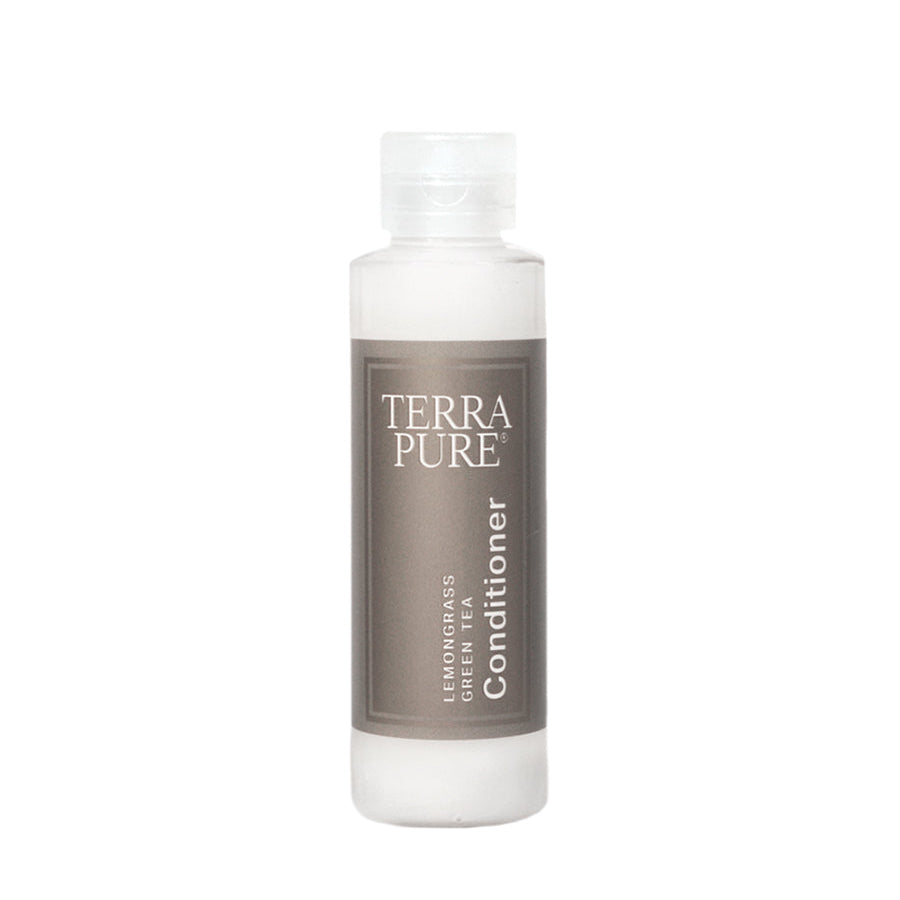 Pictured: Mini size of the Terra Pure Lemongrass Green Tea Conditioner against a white background. it is in a clear plastic bottle with a clear flip top cap, wrapped in a bronze label.