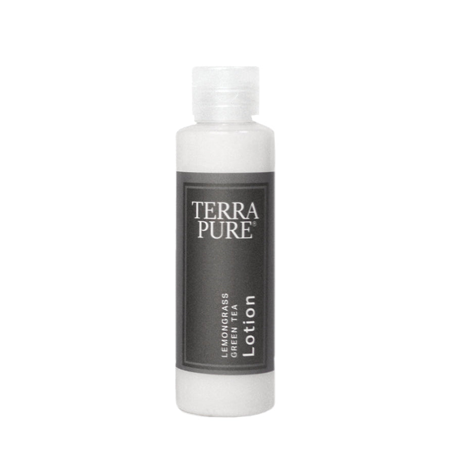Pictured: Mini size of the Terra Pure Lemongrass Green Tea Lotion against a white background. it is in a clear plastic bottle with a clear flip top cap, wrapped in a dark grey label.