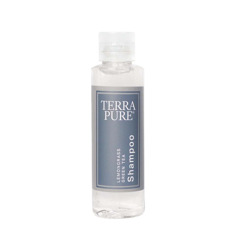 Pictured: Mini size of the Terra Pure Lemongrass Green Tea Shampoo against a white background. it is in a clear plastic bottle with a clear flip top cap, wrapped in a blue label.