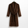 Brown robe on a hanger against a white background