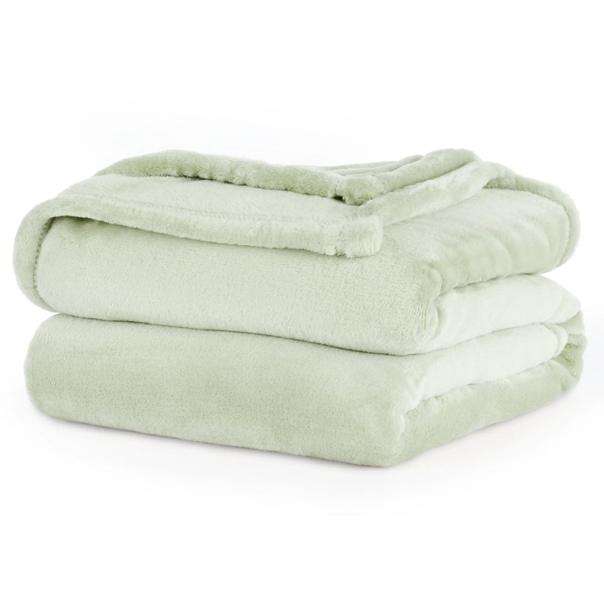 Product shot of throw blanket in a pastel green color. Product is fluffy and folded neatly with a white backdrop.
