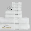 Stack of white towels with Yellowfin logo on a gray background