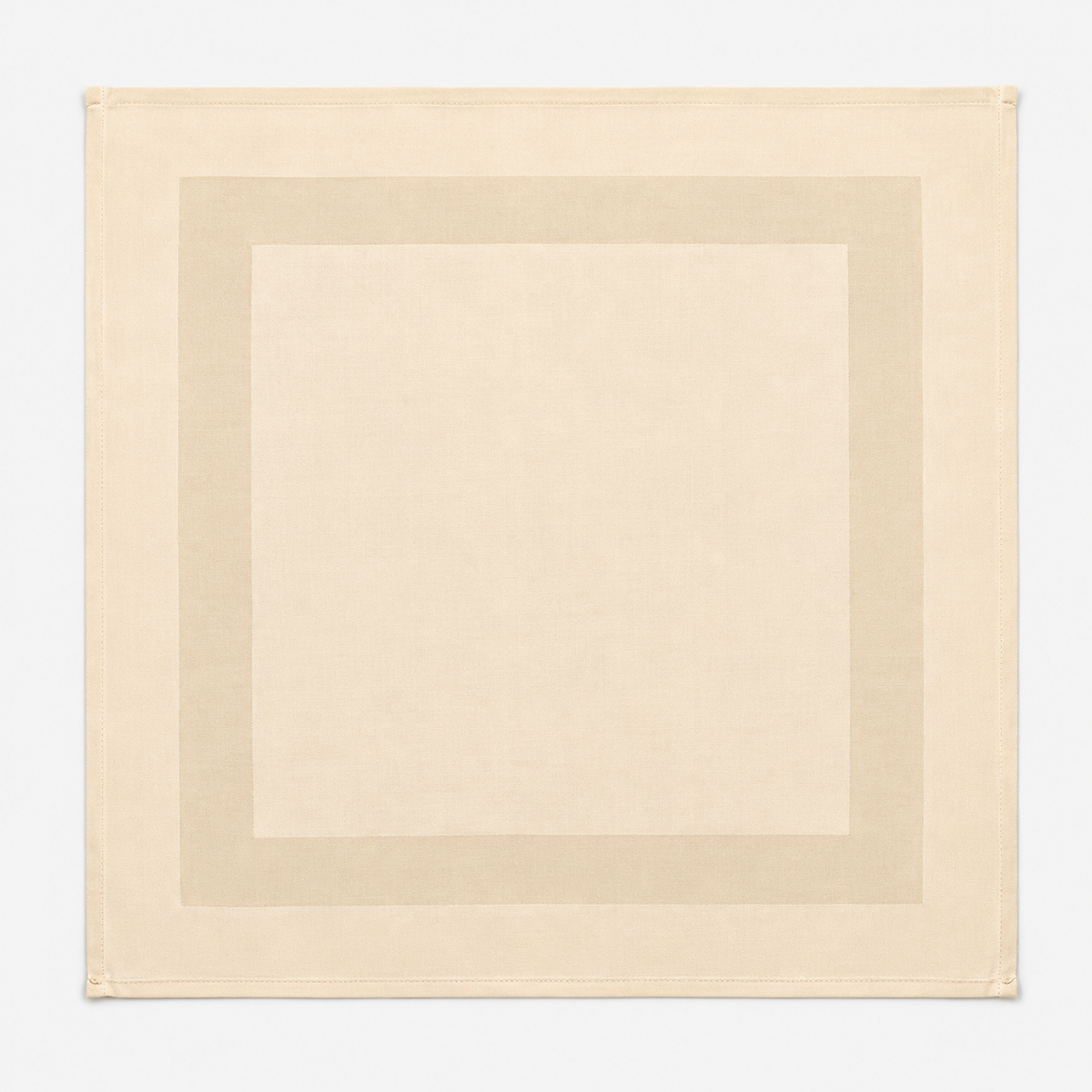 Pictured: Square beige napkin with a satin band acting as a border in the middle. This napkin is laid out against a white background.