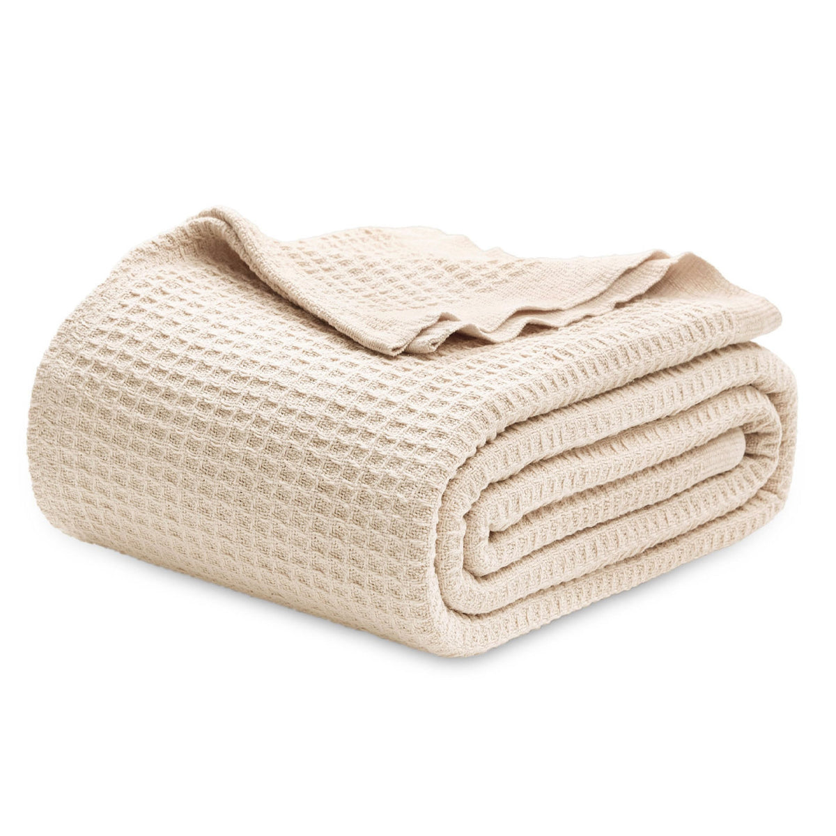 Pictured: Neatly folded waffle woven blanket against a white background. This blanket is in the shade "Beige".