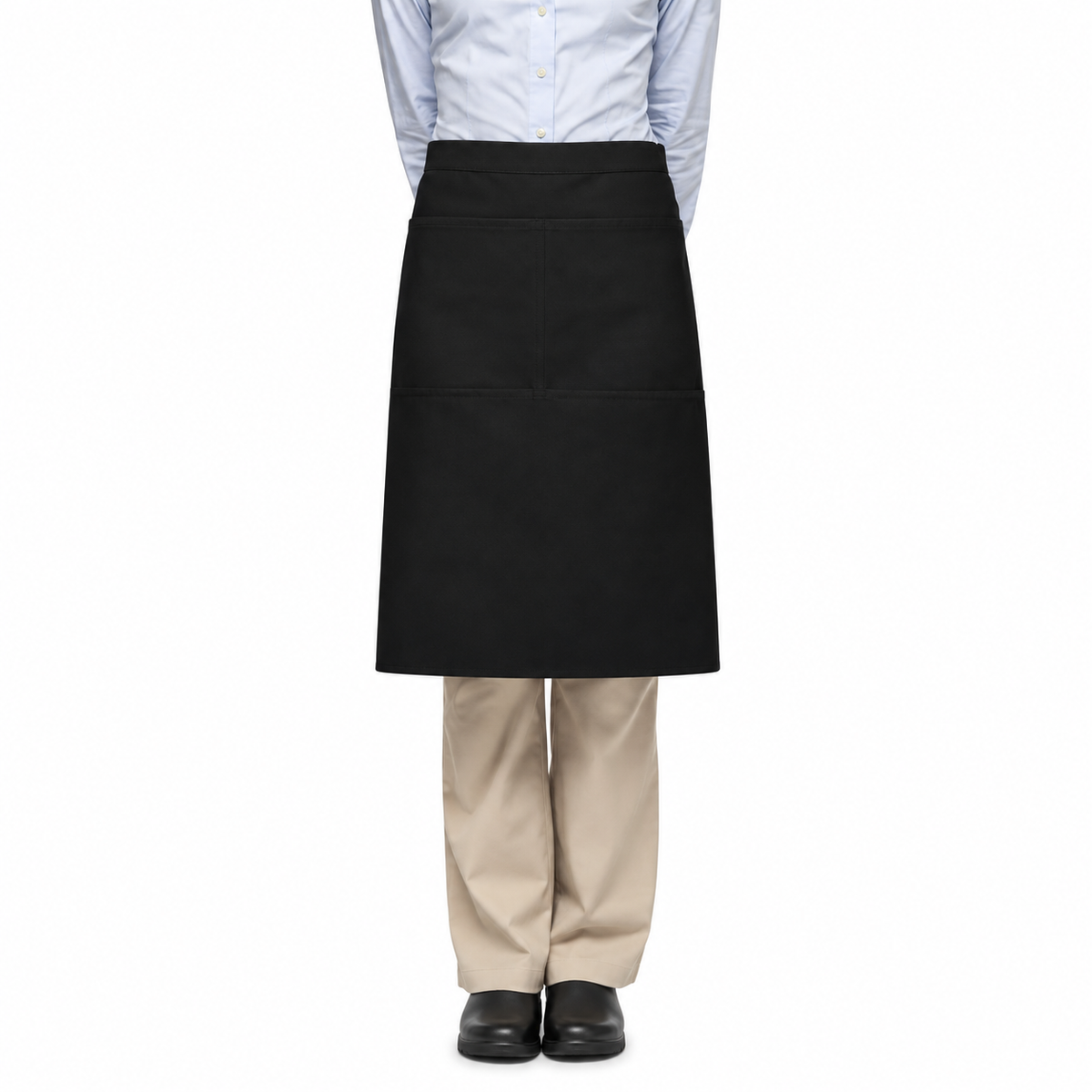 Pictured: Model wearing a collared shirt and khakis. On top of that, they have the Black Bistro Apron tied around their waist.