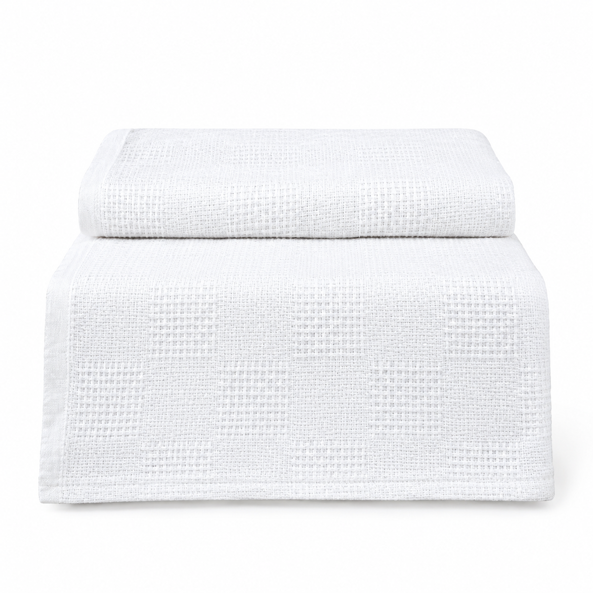 Pictured: White Healthcare Cotton Thermal Blanket folded at the top with the bottom half draped over an object against a white background.