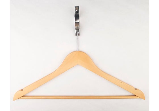 Wooden hanger with a metal hook on a white background
