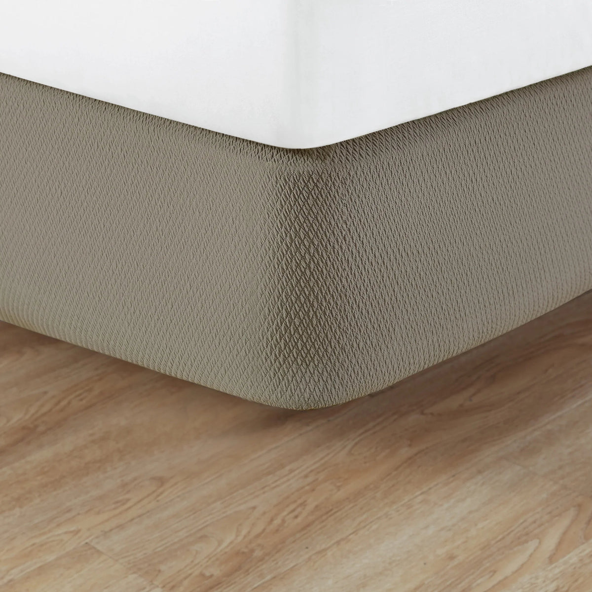 Pictured: Knit2Fit Box Spring Wrap featured in the shade Teak. It has a diamond pattern texture.