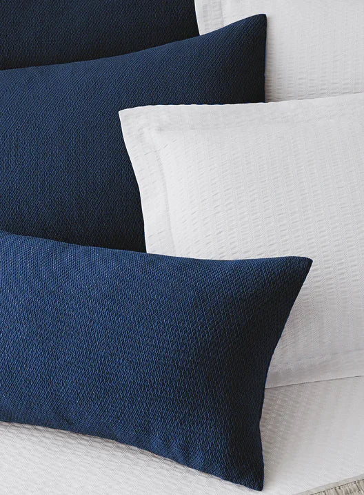 Decorative Pillows with soft texture in white and dark blue/navy.