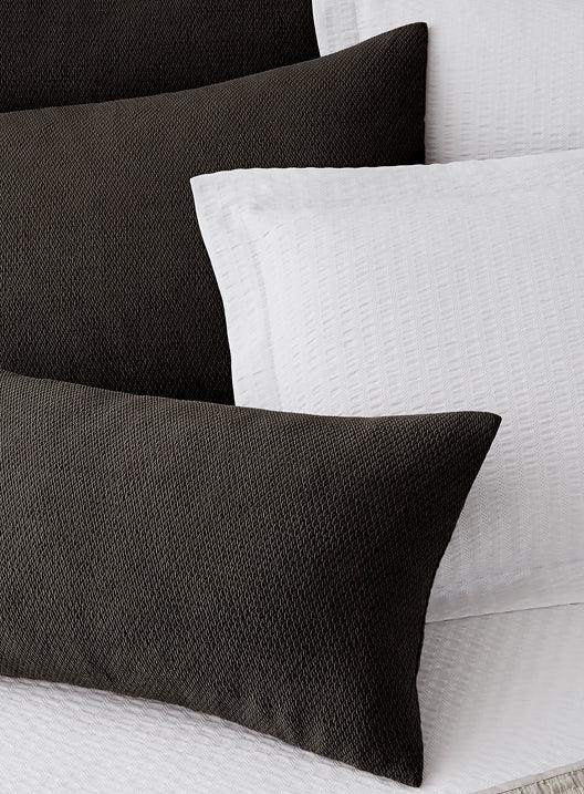Decorative Pillows with soft texture in white and black.