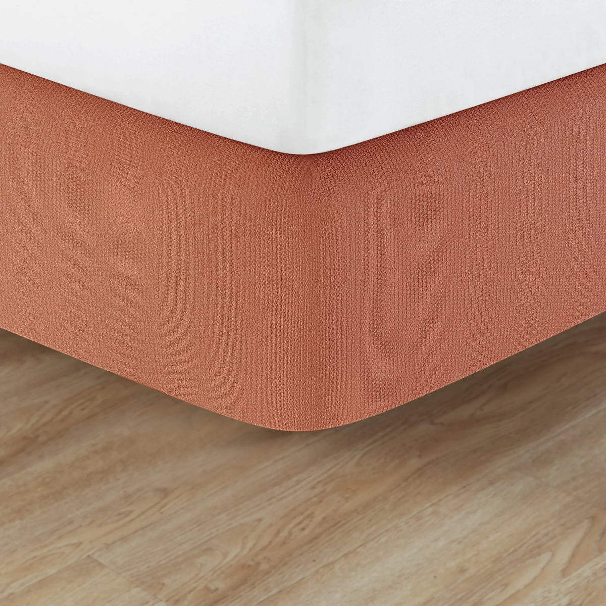 Pictured: Knit2Fit Helix Box Spring Wrap featured in the shade Paprika.