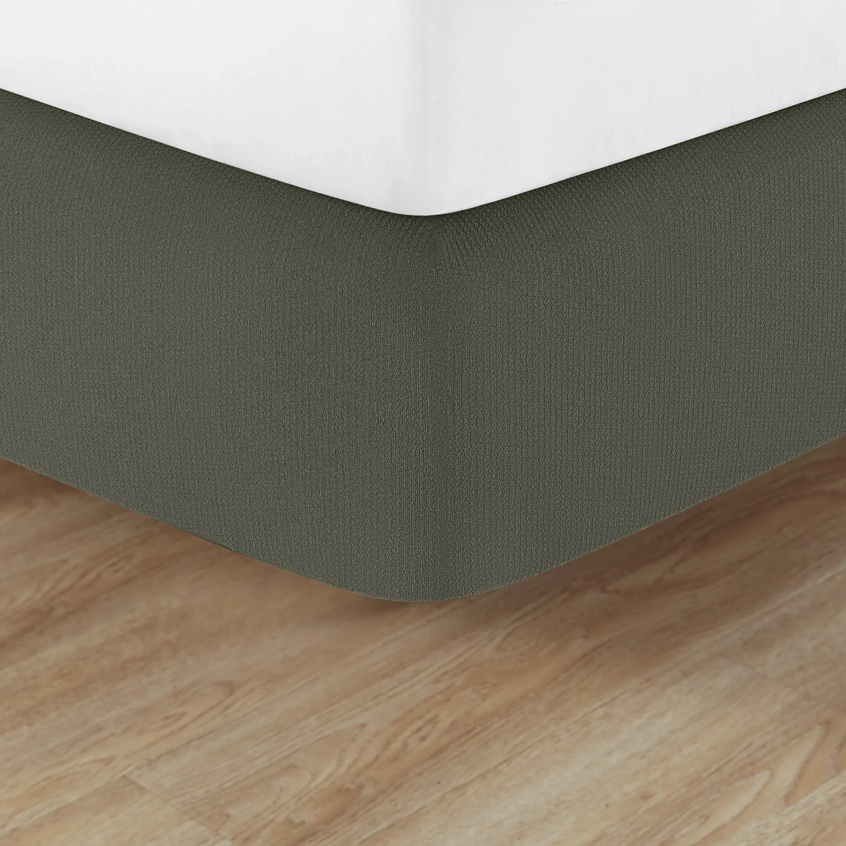 Pictured: Knit2Fit Helix Box Spring Wrap featured in the shade Moss.
