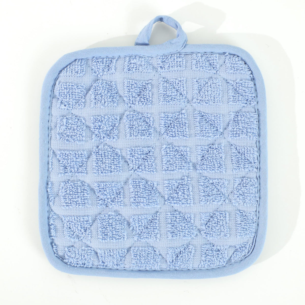 Pictured: Closeup of the Martex pot holder against a white background. This pot holder is in the shade Solid Blue.
