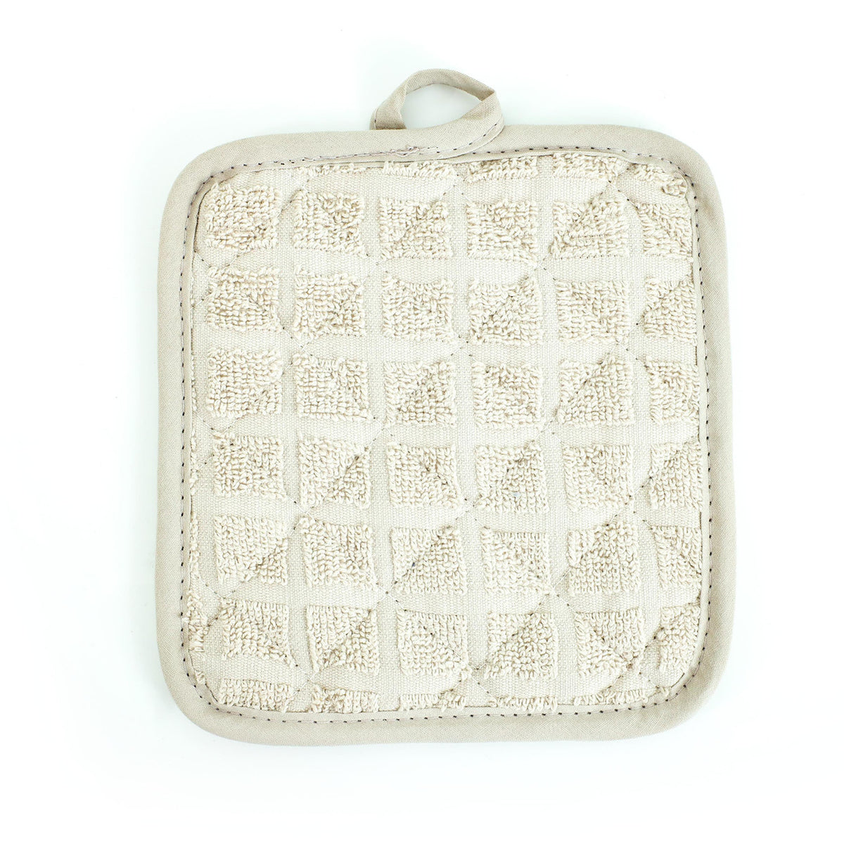 Pictured: Closeup of the Martex pot holder against a white background. This pot holder is in the shade Solid Khaki.