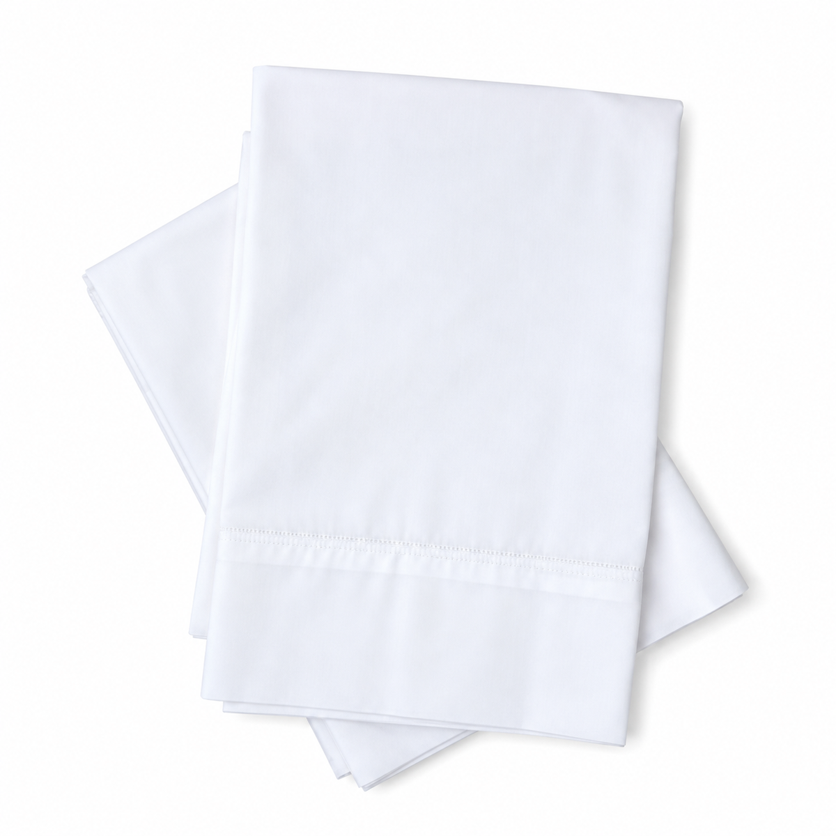 Pictured: Two neatly folded white sheets laid on top of each other against a white background. These pillows have the Royal Suite T-300 Pillowcase on them.