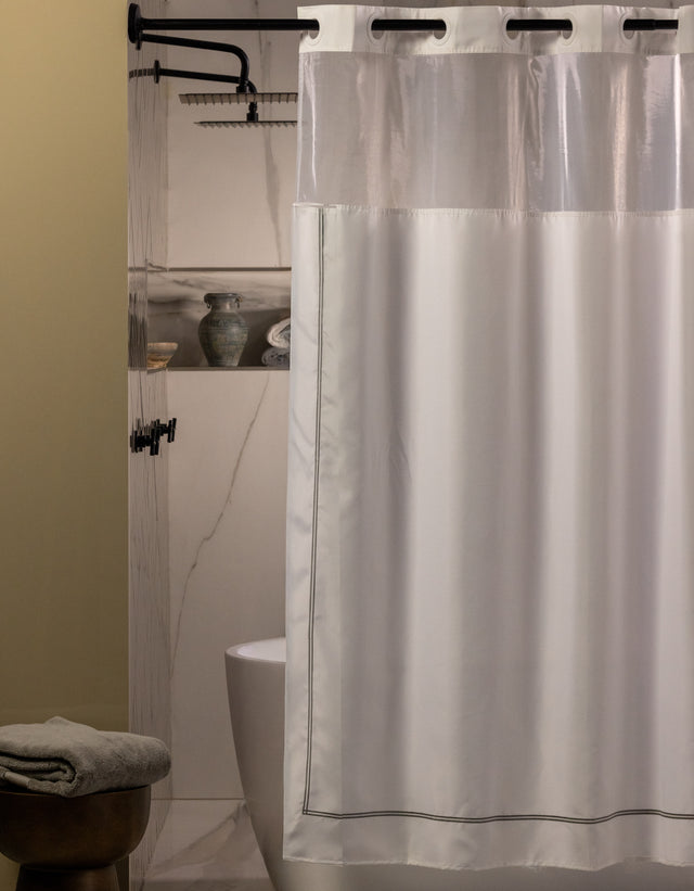 Hookless Shower Curtain in a Moody bathroom and marble walls