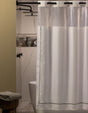 Hookless Shower Curtain in a Moody bathroom and marble walls