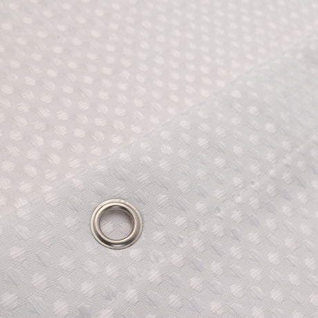 Metallic washer on a textured gray background